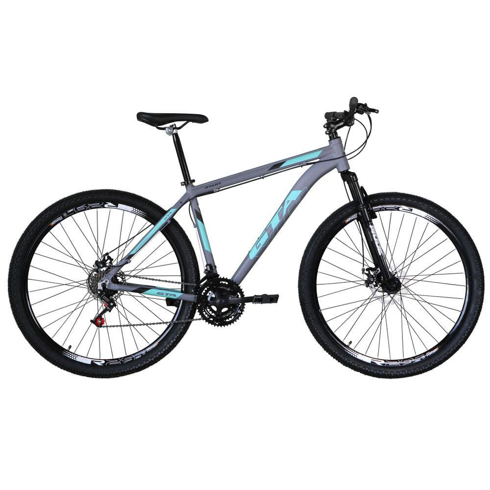 Bicicleta Aro 29 Gta Start Alumínio 27v K7 Freio a Disco Mecânico Garfo com Suspensão - Cinza