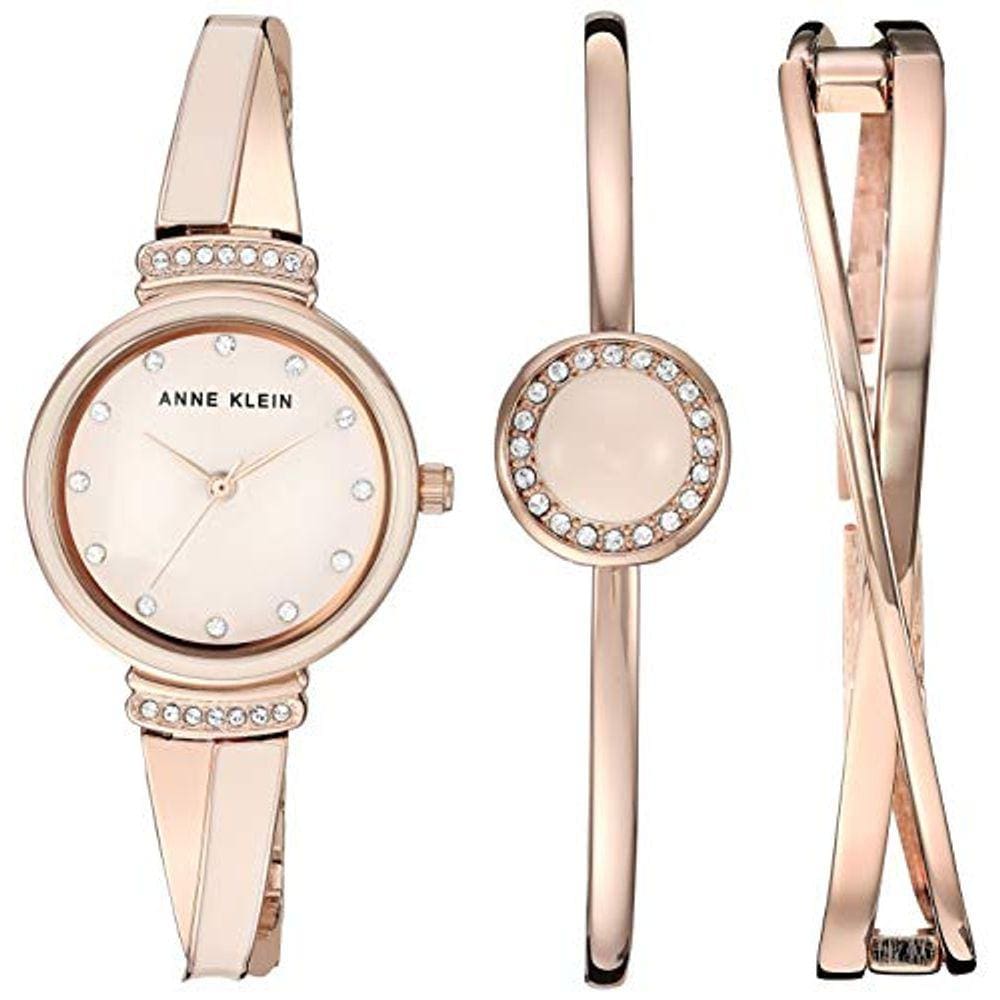 Conjunto feminino de relógio e pulseira em tom de ouro rosa com detalhes em cristal