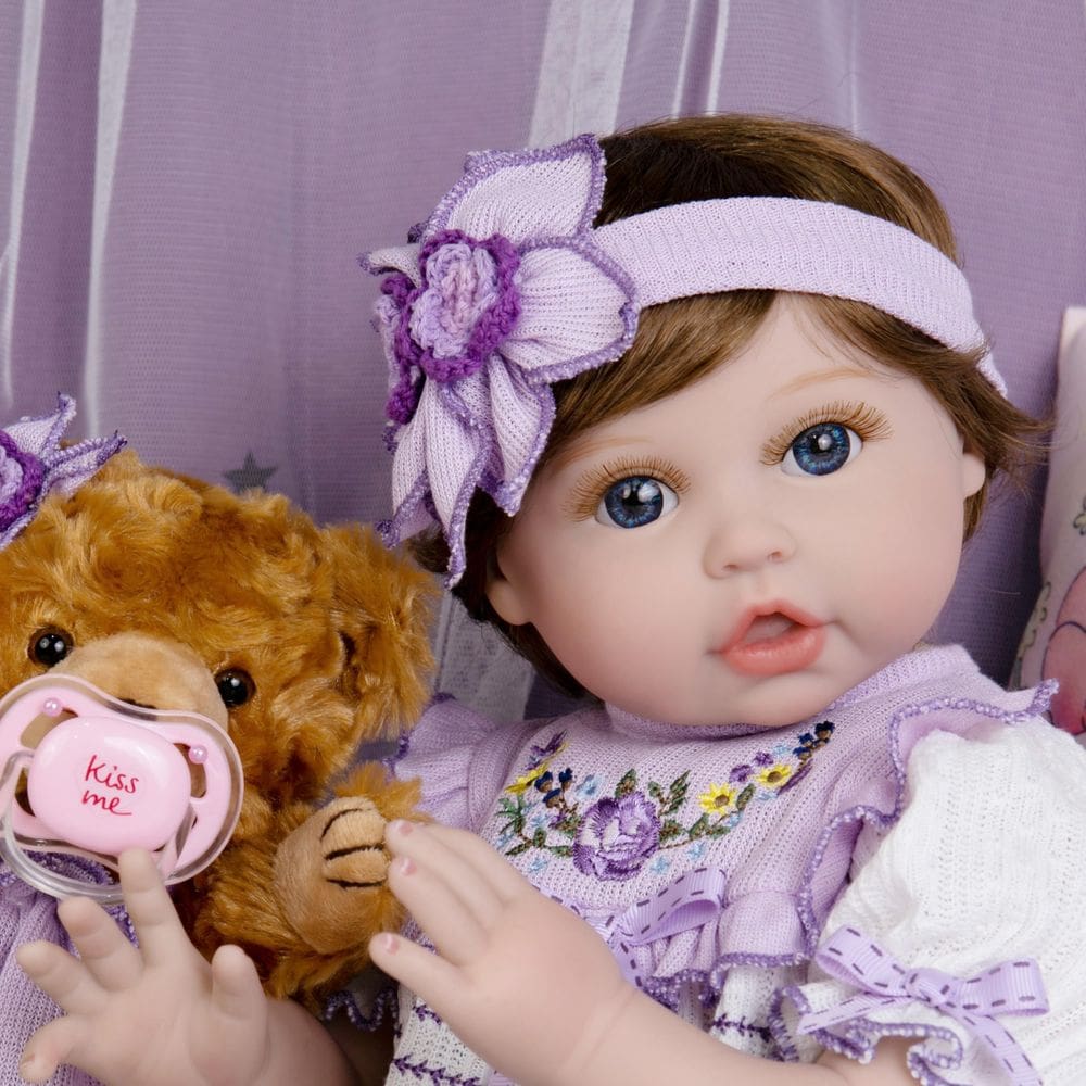 Boneca Reborn EKOKIZ realista de 22 polegadas com roupas e brinquedos