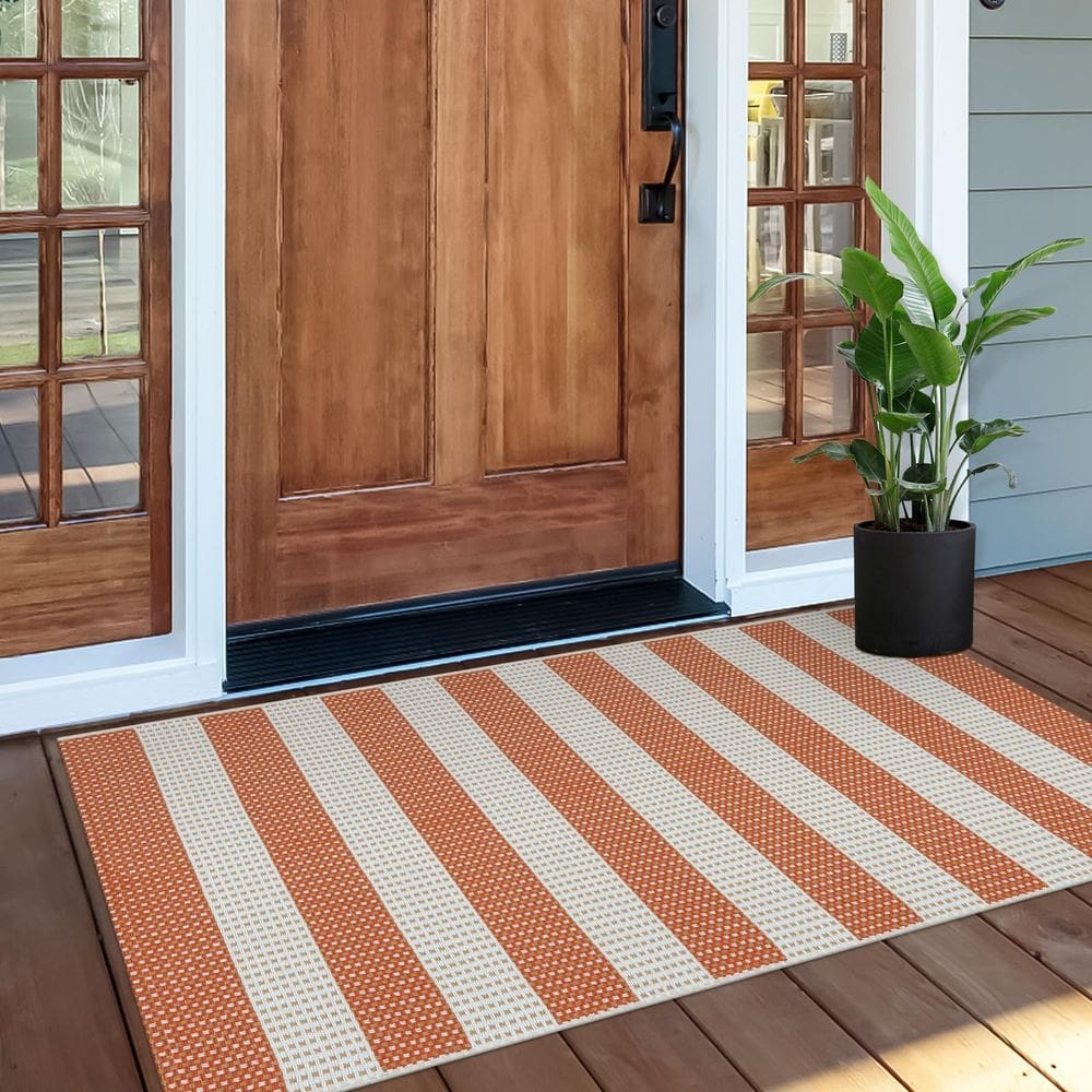 Tapete OJIA Front Door 60x130cm de algodão listrado laranja e branco