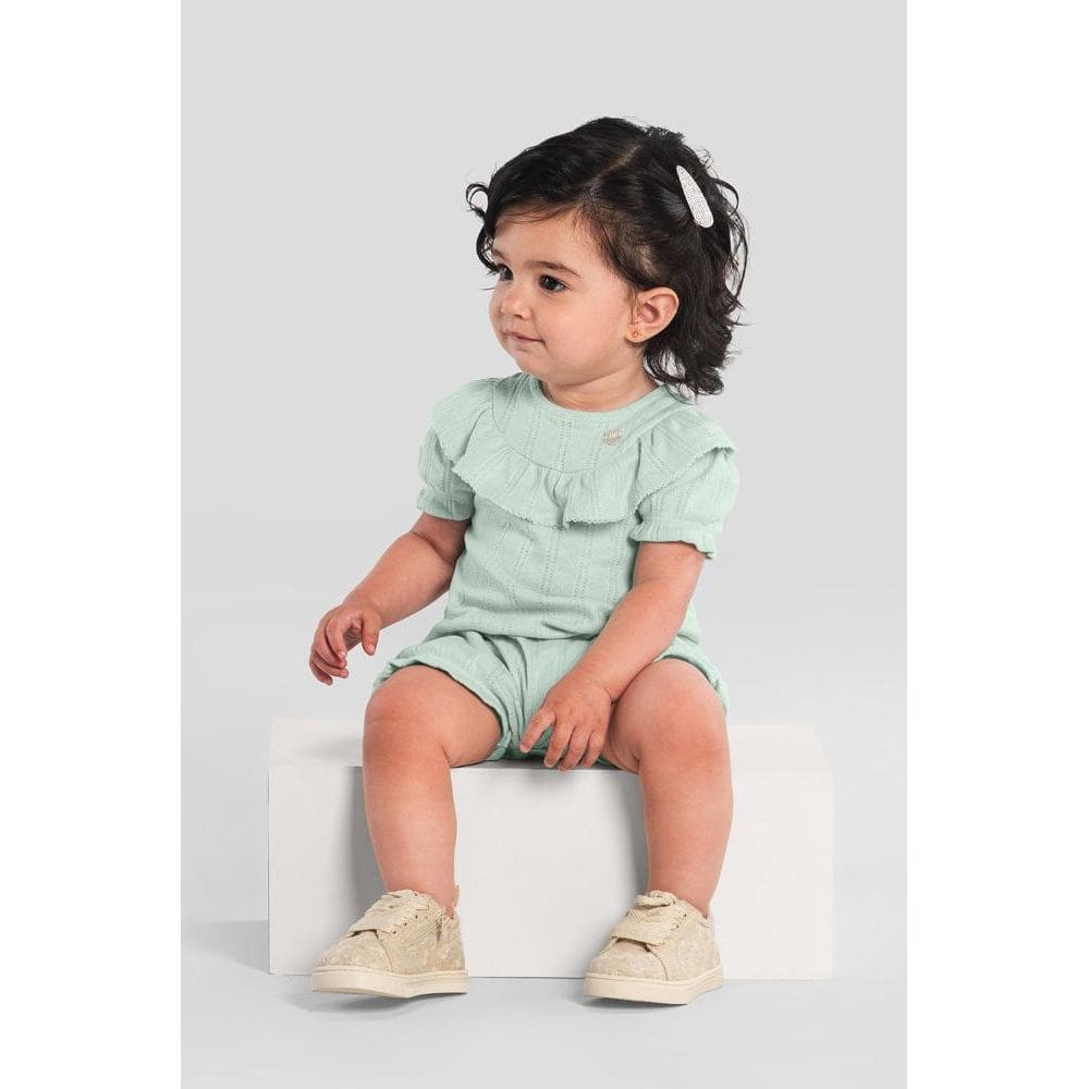 Macaquinho bebê menina em ribana Mundi